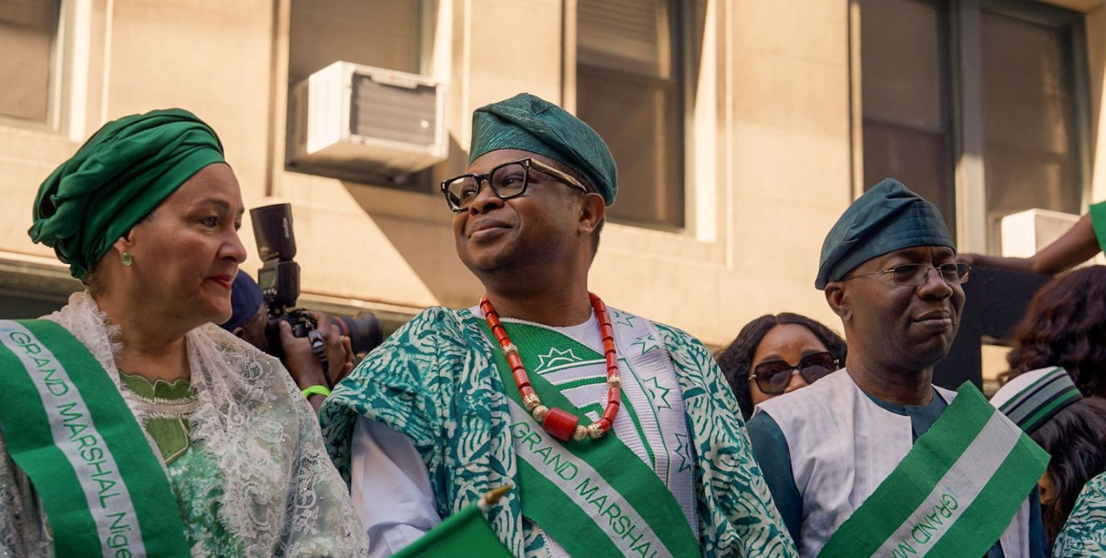 A guest celebrating with the Nigerian flag