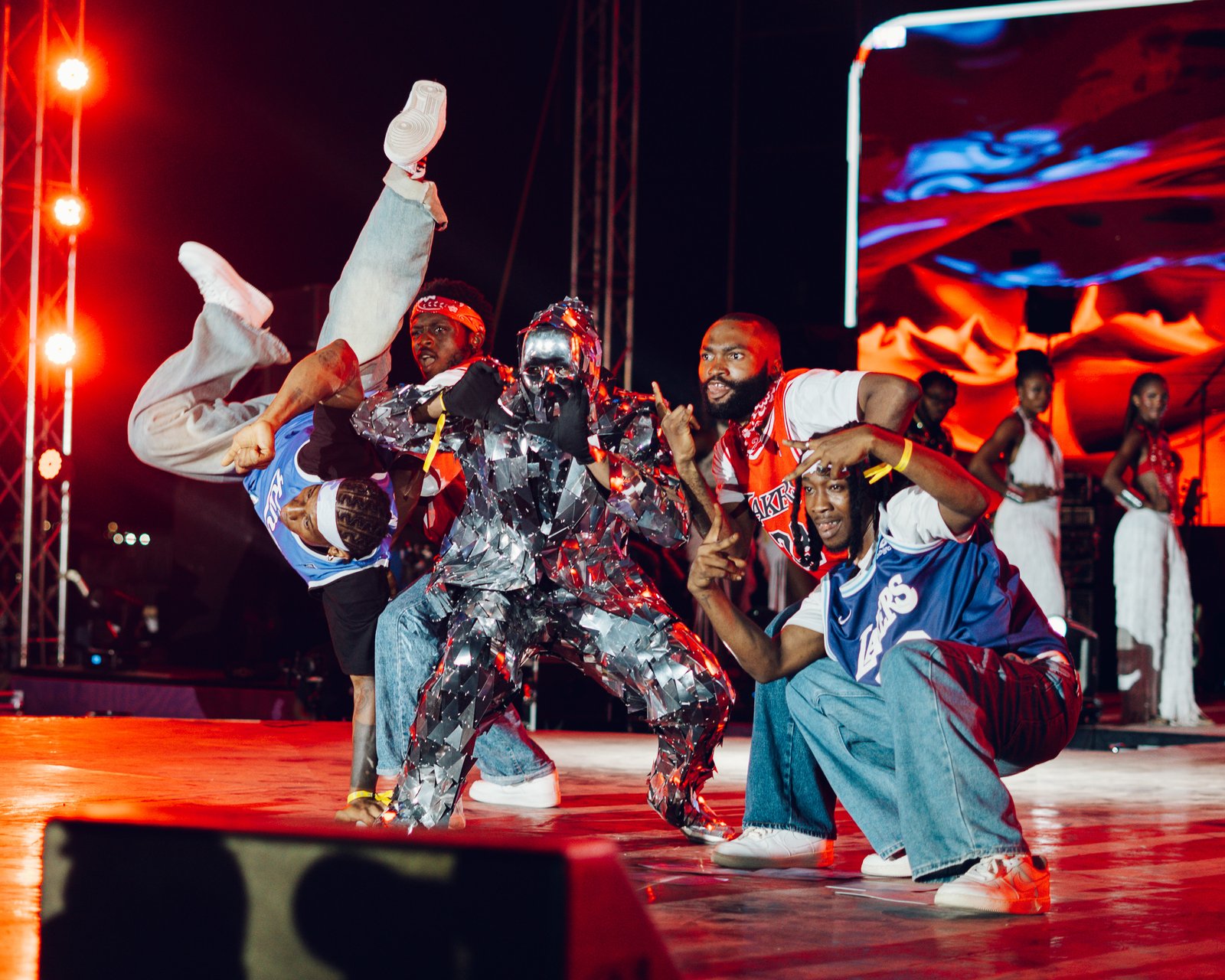 A dance crew performing on stage